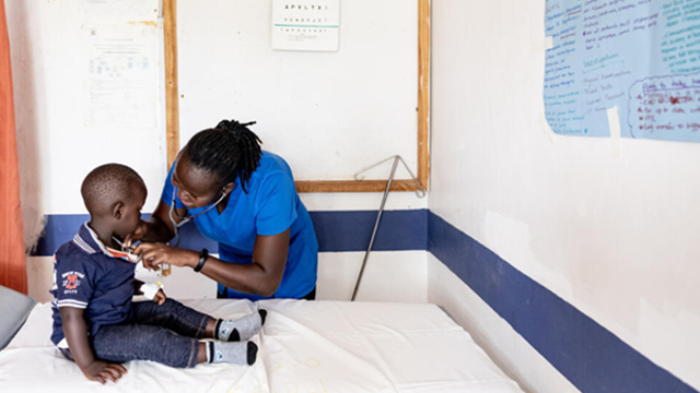 Woman and child in a Kenyan clinic