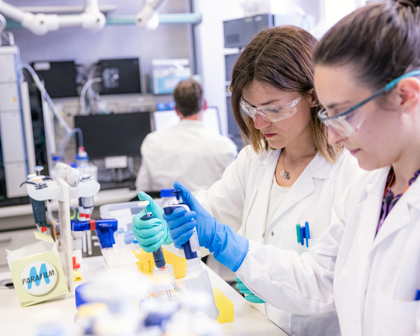 Scientists Collaborating And Conducting Vaccine Research