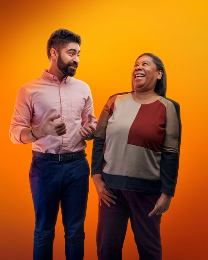 Two colleagues smiling