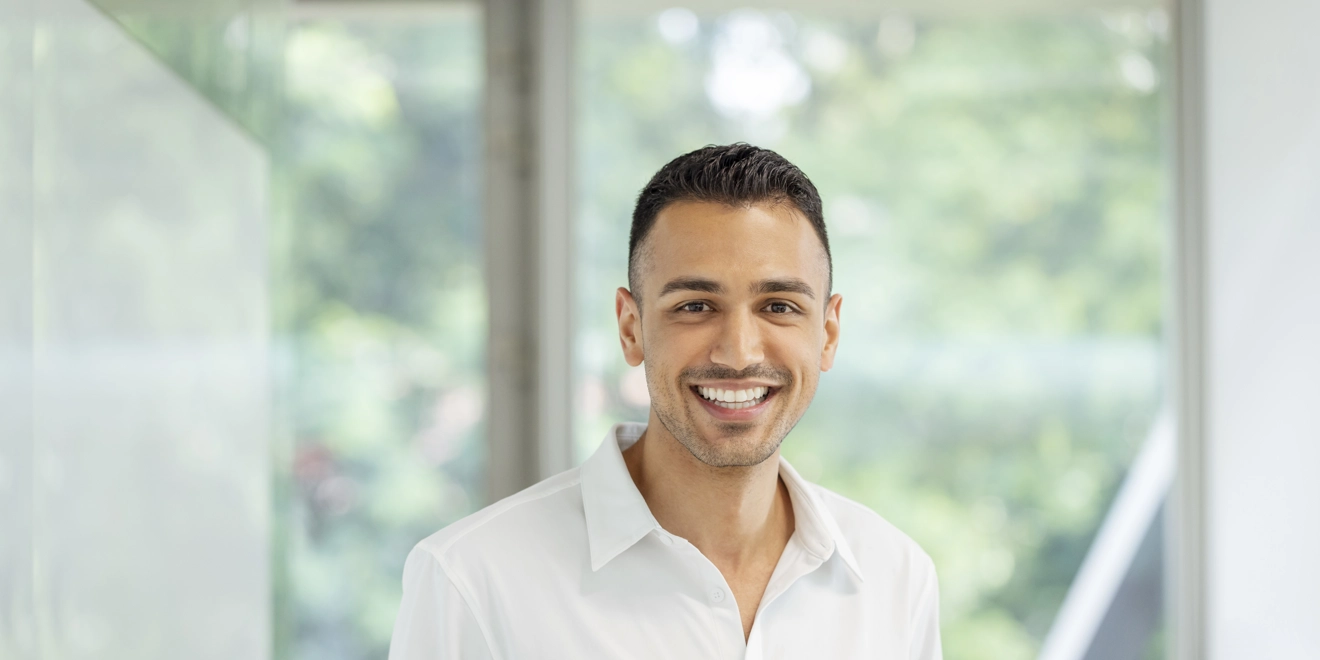 One person smiling in Singapore office