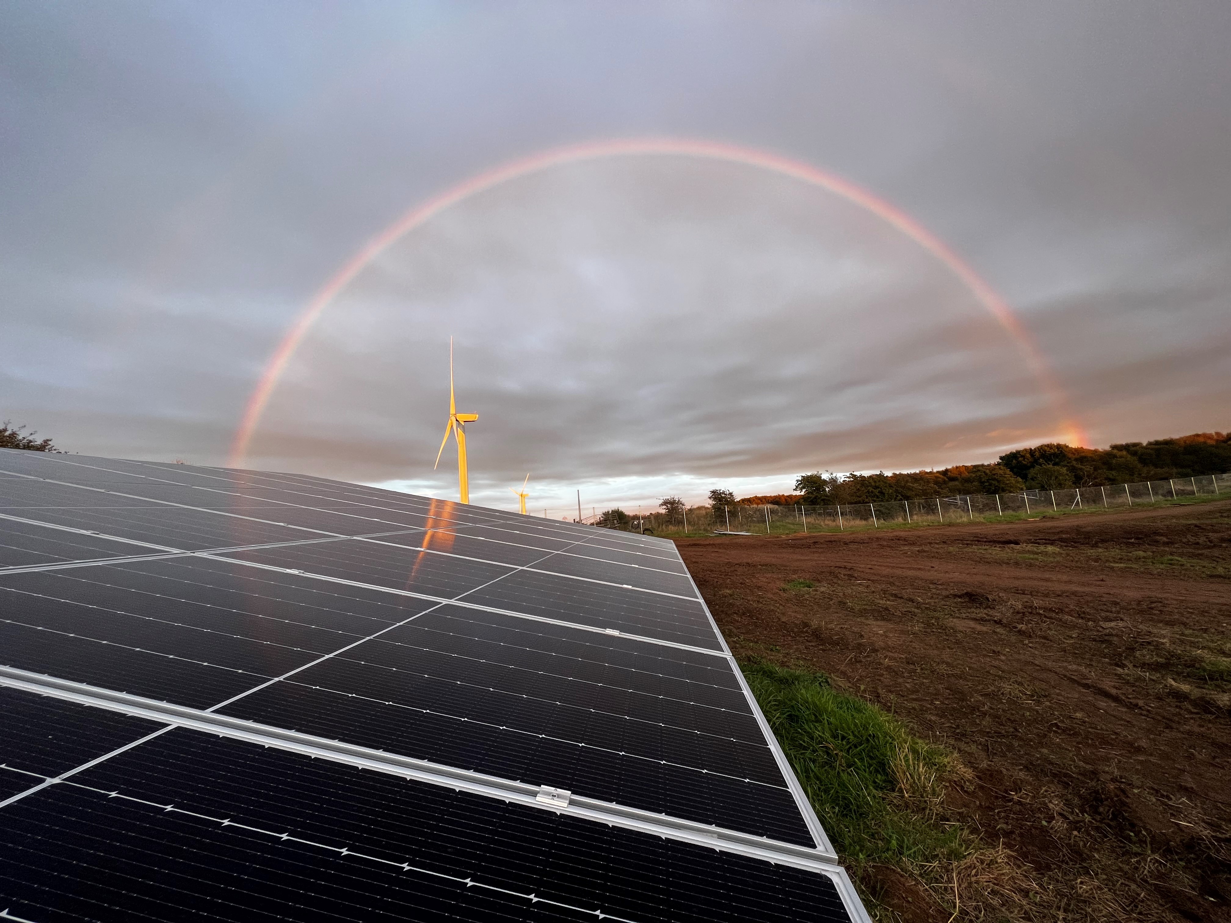 Solar panels with a rainbow in Irvine