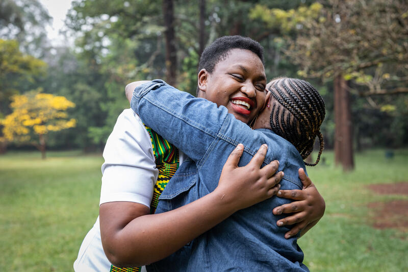 Two people hugging