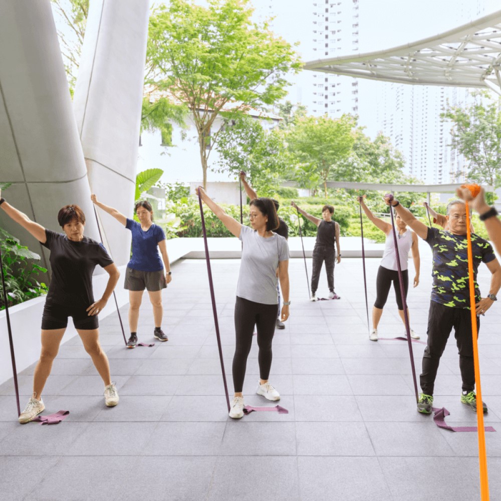 Women in a Gym using resistance bands