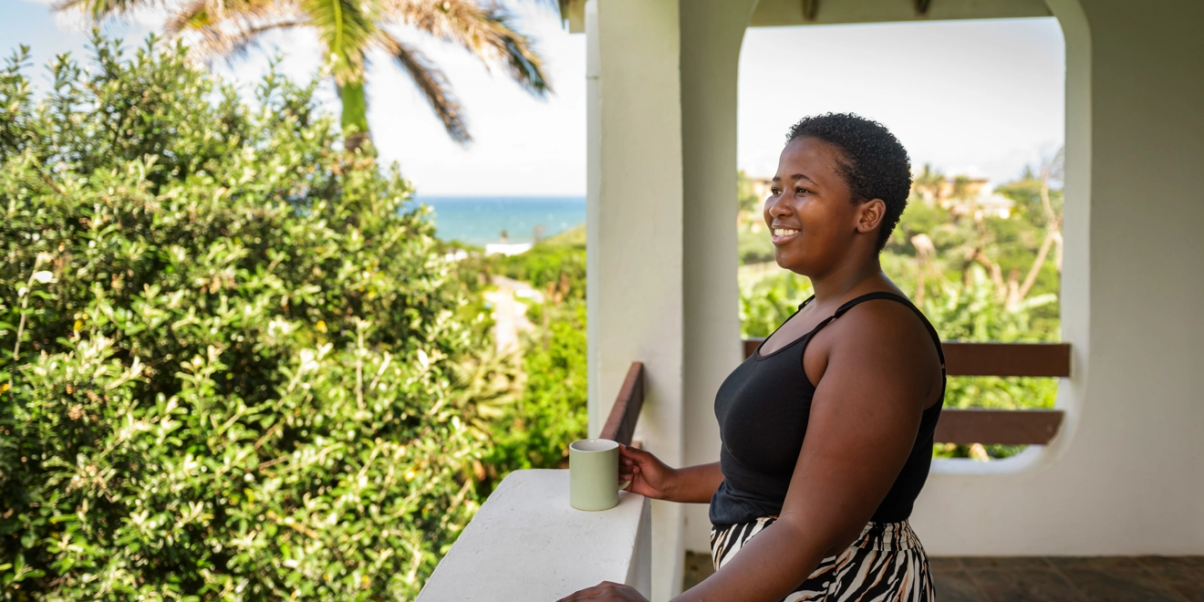 Woman smiling on balcony