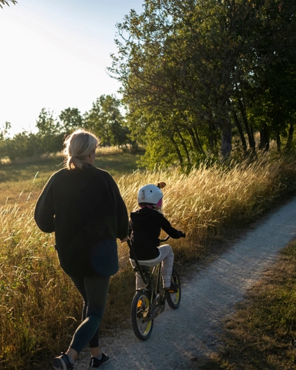 Woman and child riding a bike