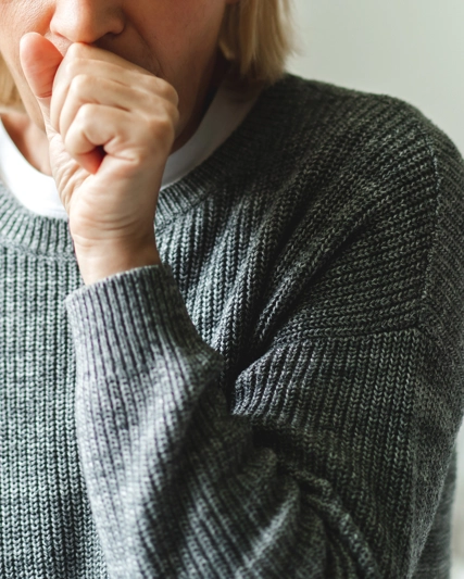 Person coughs in bedroom