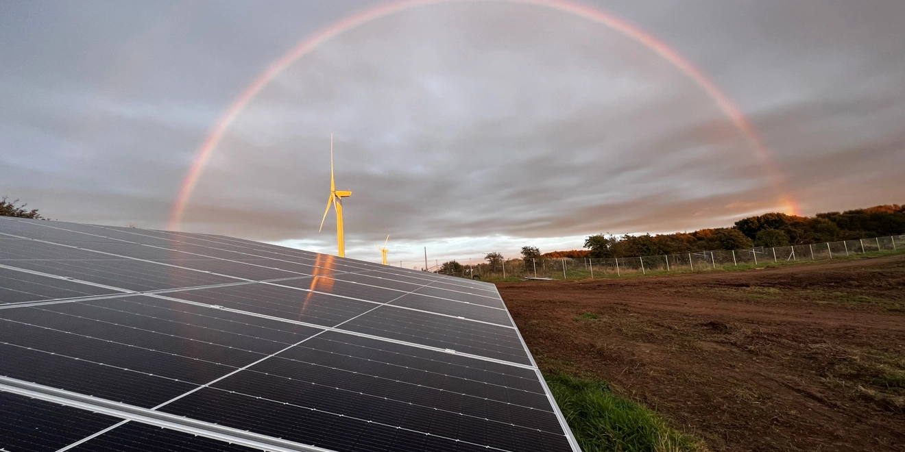 Solar panels with a rainbow in Irvine